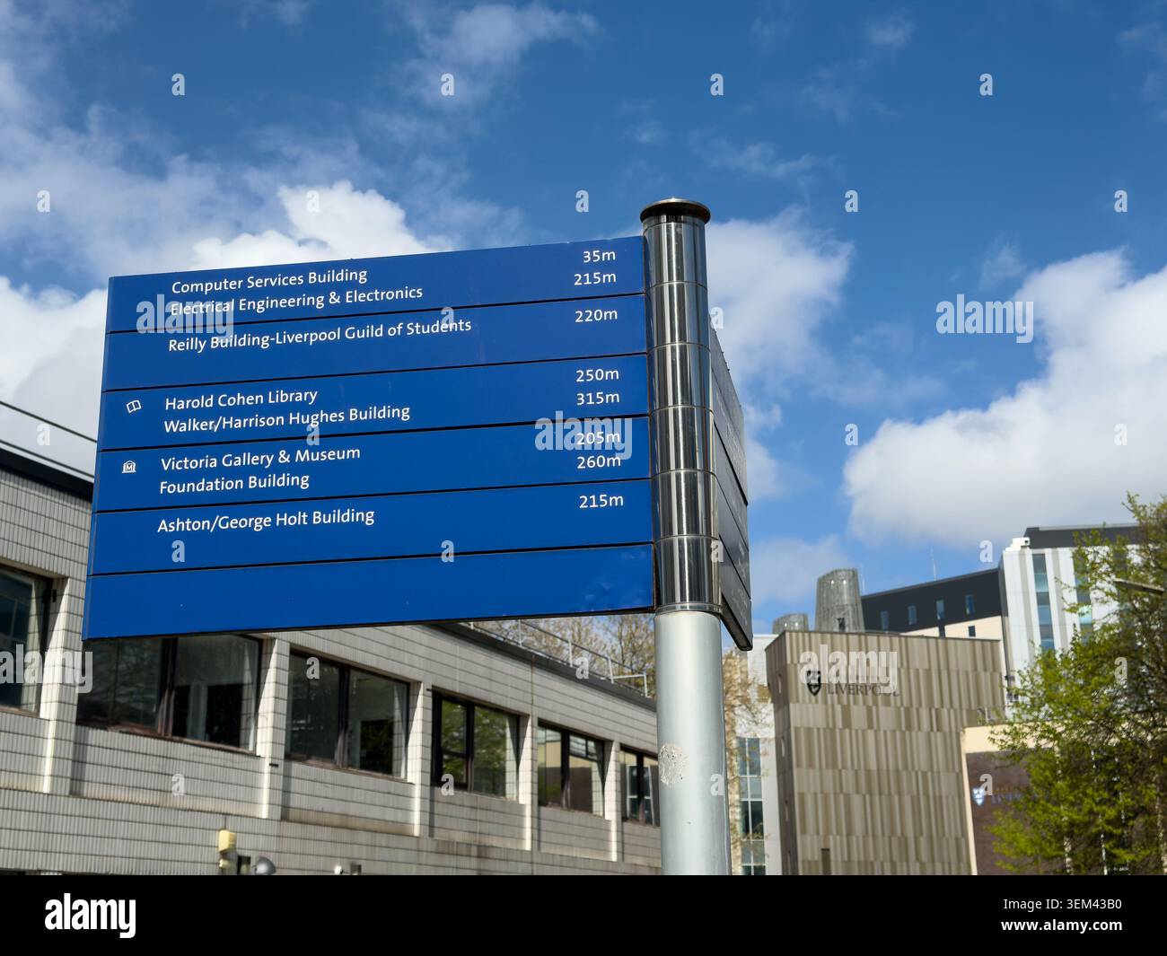 LIVERPOOL, MERSEYSIDE, ENGLAND - APRIL 16, 2026: Liverpool University directional signboard shows distances to faculty buildings on the main campus, M - Smartphone Captured Stock Image