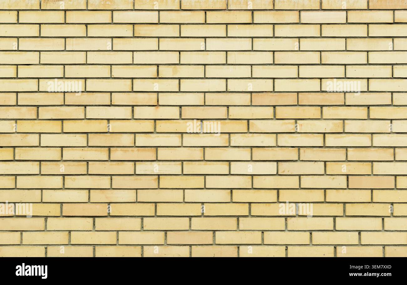 Yellow brick wall, brickwork texture, background Stock Photo