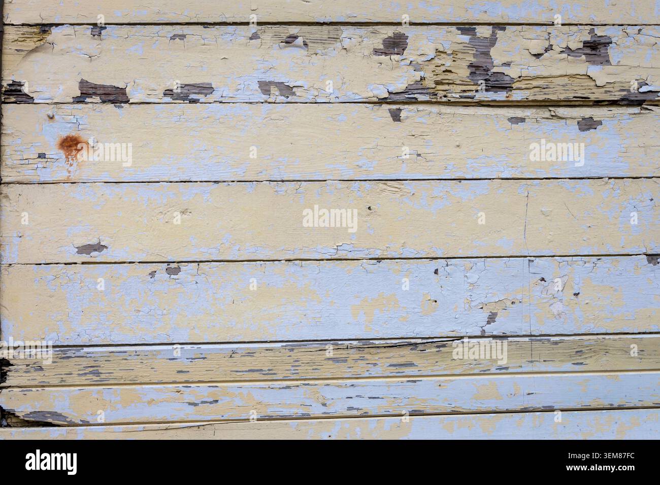Weathered Peeling Paint on Rustic Wooden Wall Texture Background Stock Photo