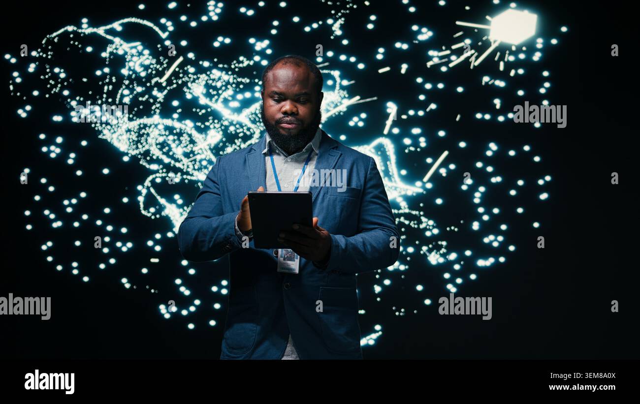 Computer scientist optimizes neural network neurons map with tablet and AR simulation tech. African american man fine tuning machine learning AI model synaptic weights with device, camera A Stock Photo