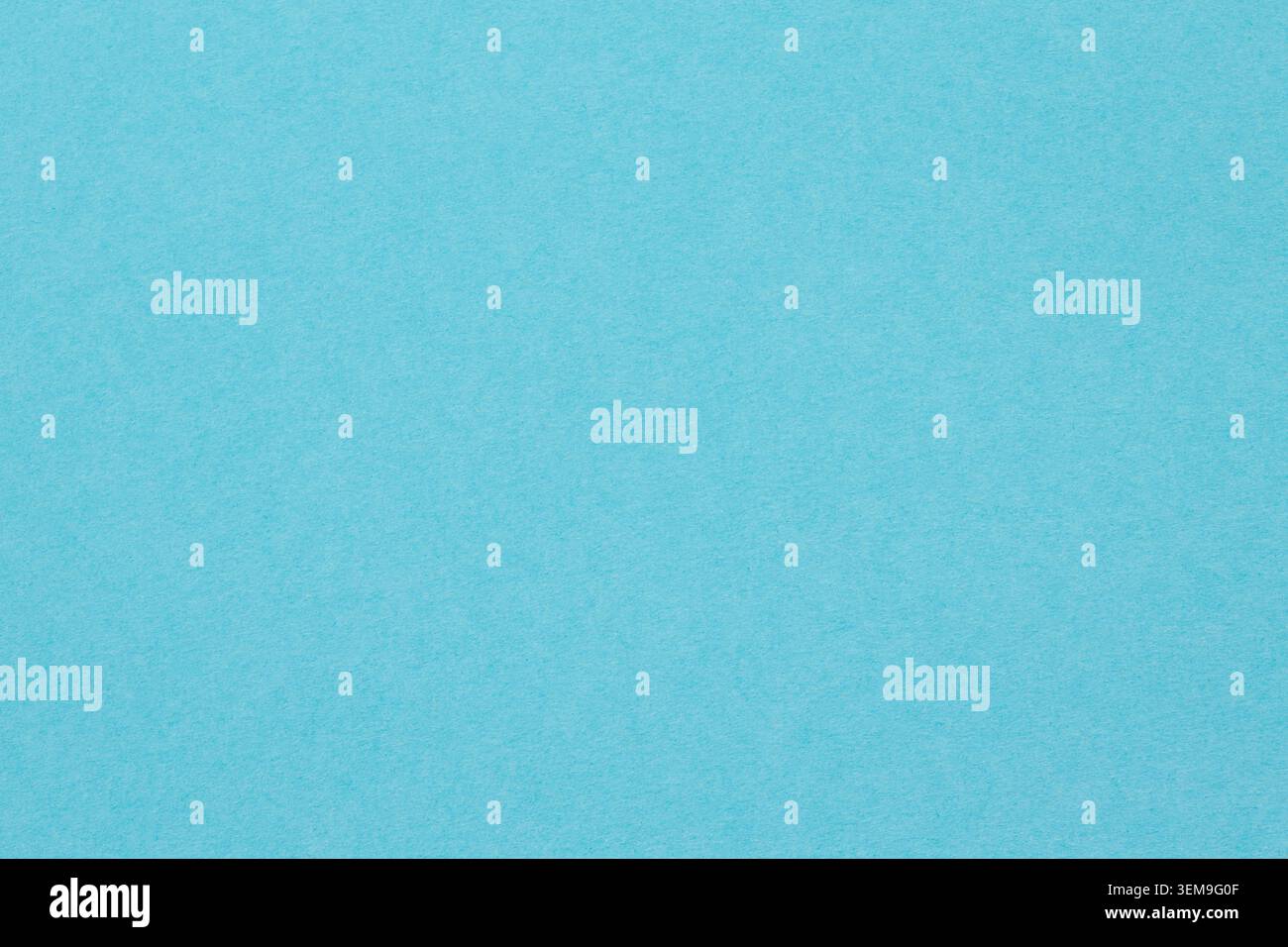 Light blue paper texture background with subtle grain for design projects Stock Photo