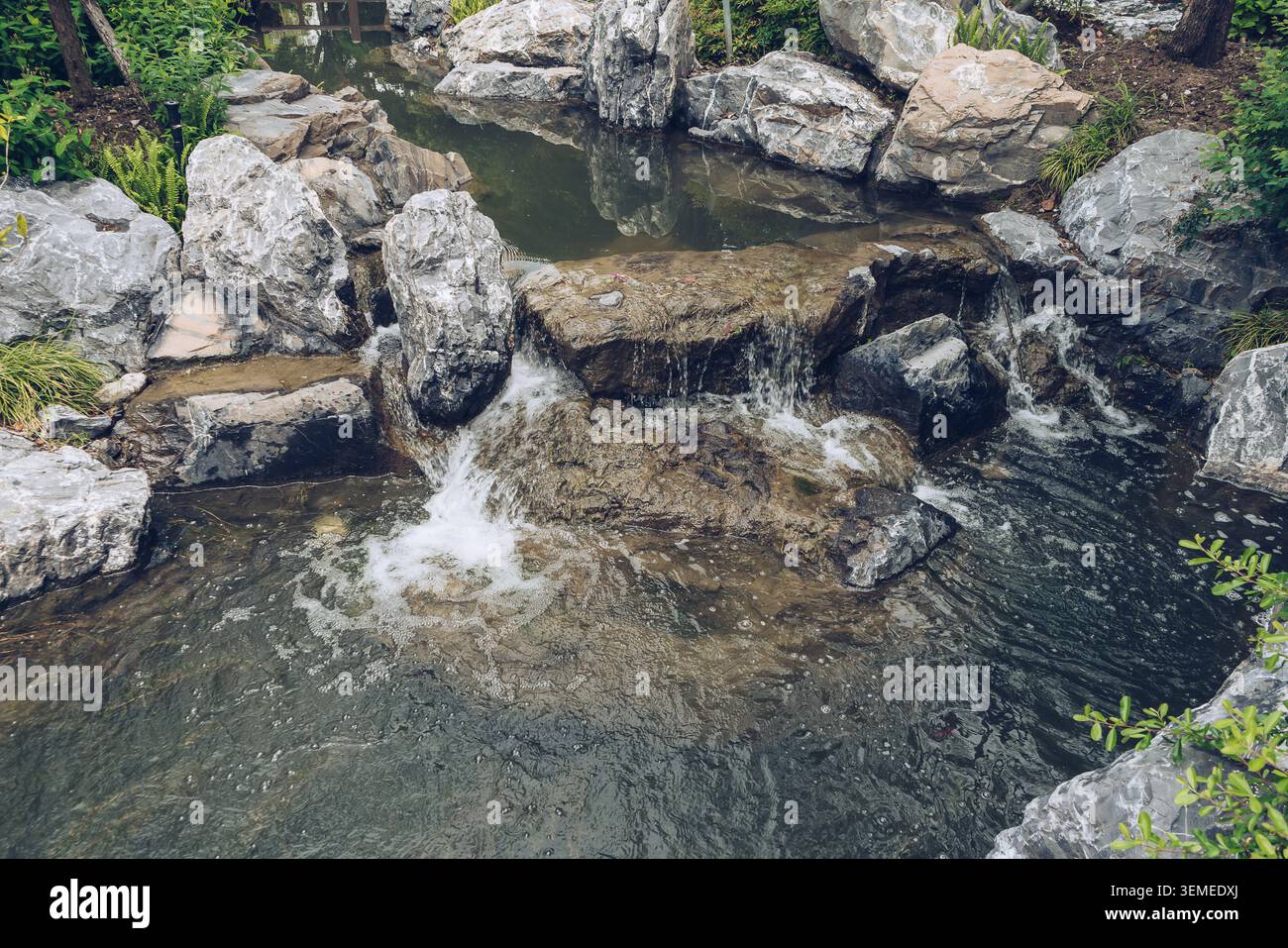 view from above on small handmade waterfall Stock Photo