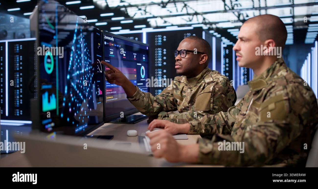 Two Data Scientists Study Deep Learning Models On Advanced AI Software. Stock Photo