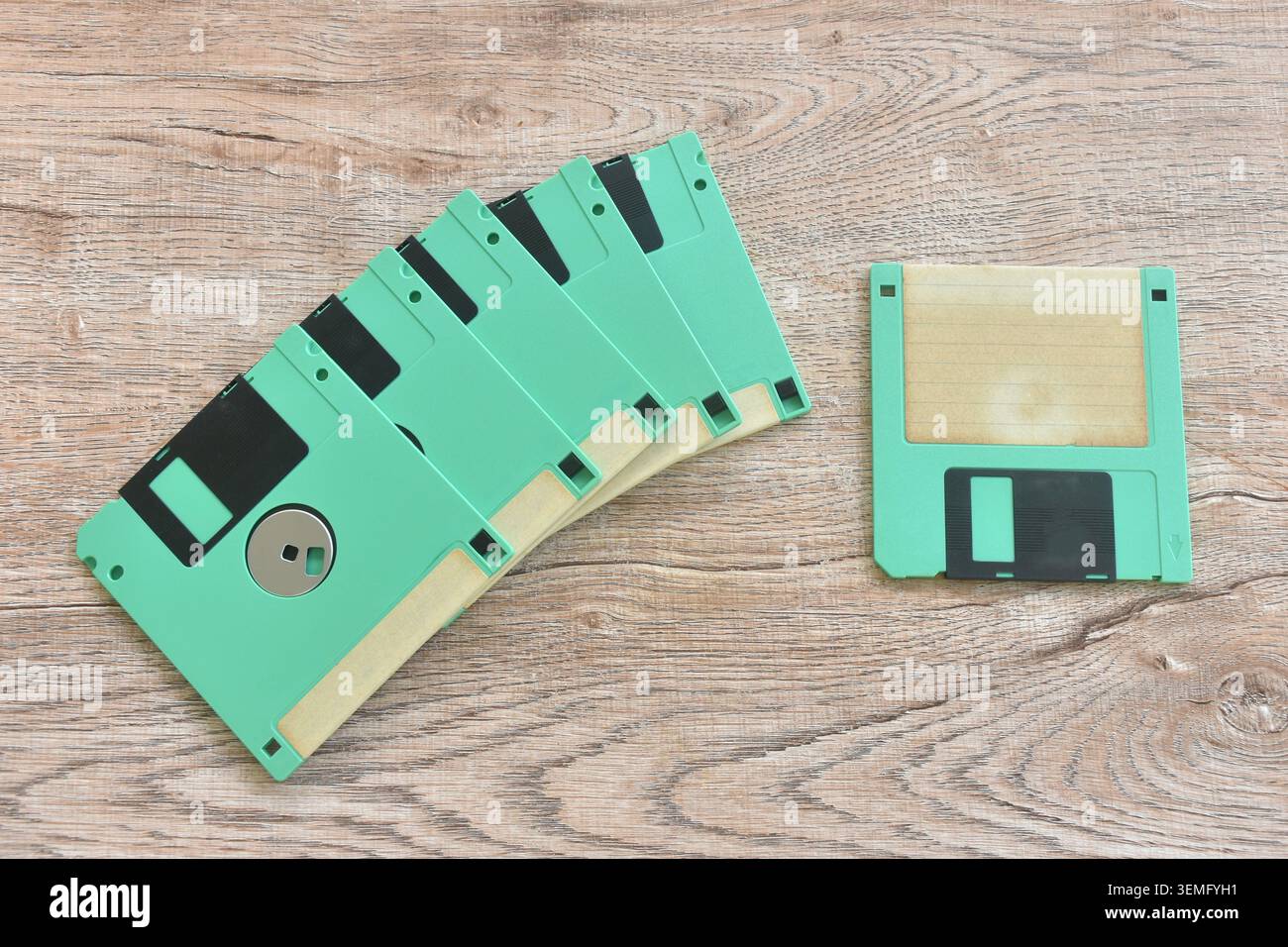 floppy disk old technology for saving data arranging on table Stock Photo