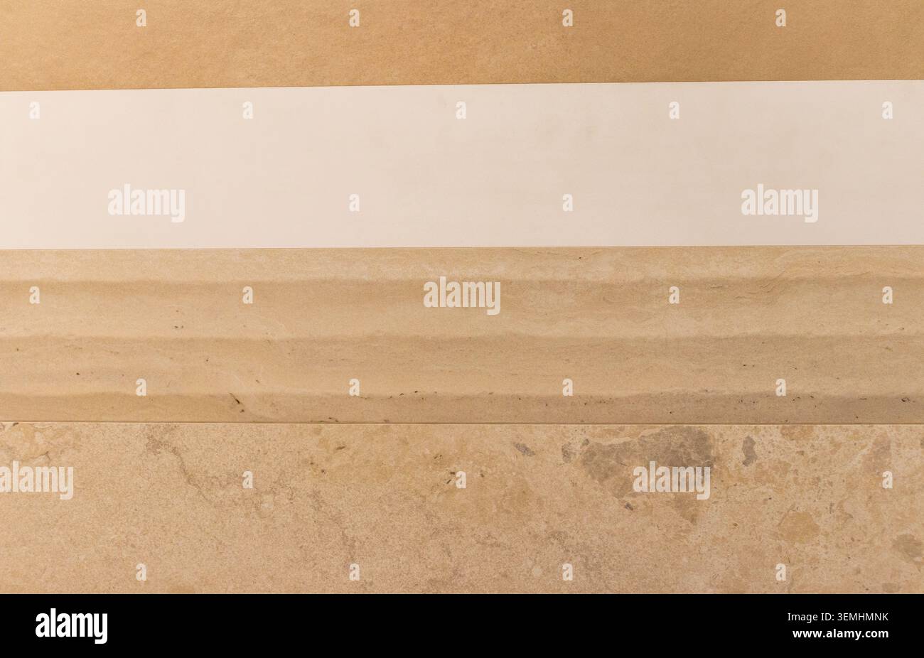 Travertine Tile Samples Display with Fluted Profile and Stone Borders Stock Photo