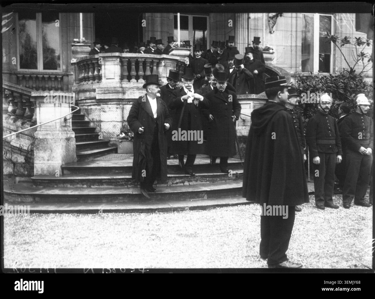Georges Clemenceau and Louis Lépine visit Choisy-le-Roi on 23 February 1908. The press photograph records their participation in a commemorative rite and documents the presence of senior French public officials at the local ceremony. Stock Photo