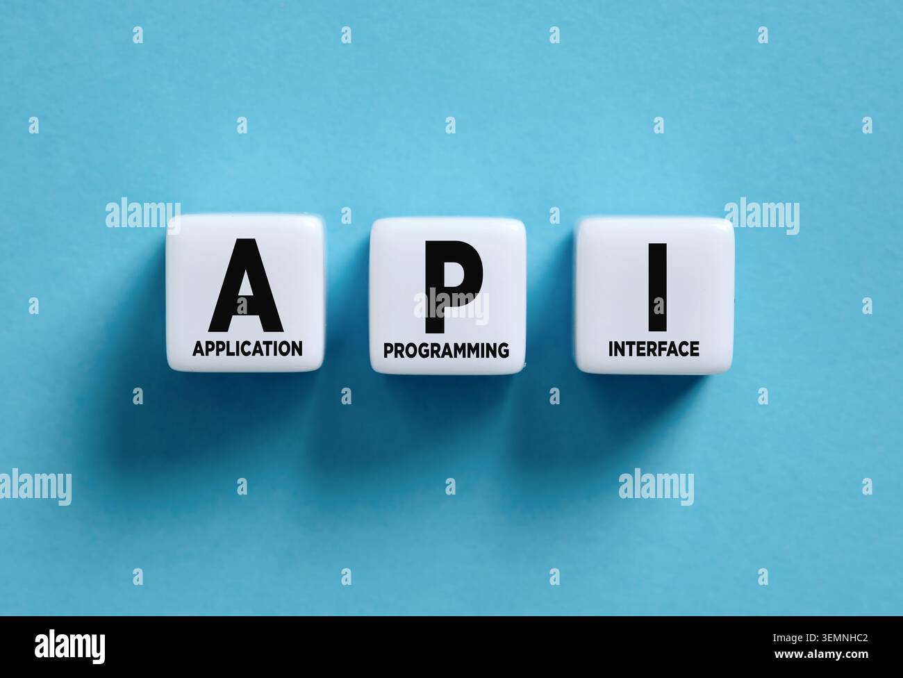 API acronym spelling application programming interface words on white square tiles, highlighting software development and integration Stock Photo