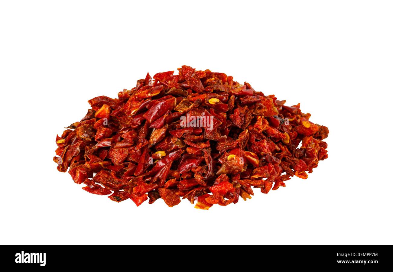 Heap of crushed red pepper flakes creating a spicy seasoning Stock Photo