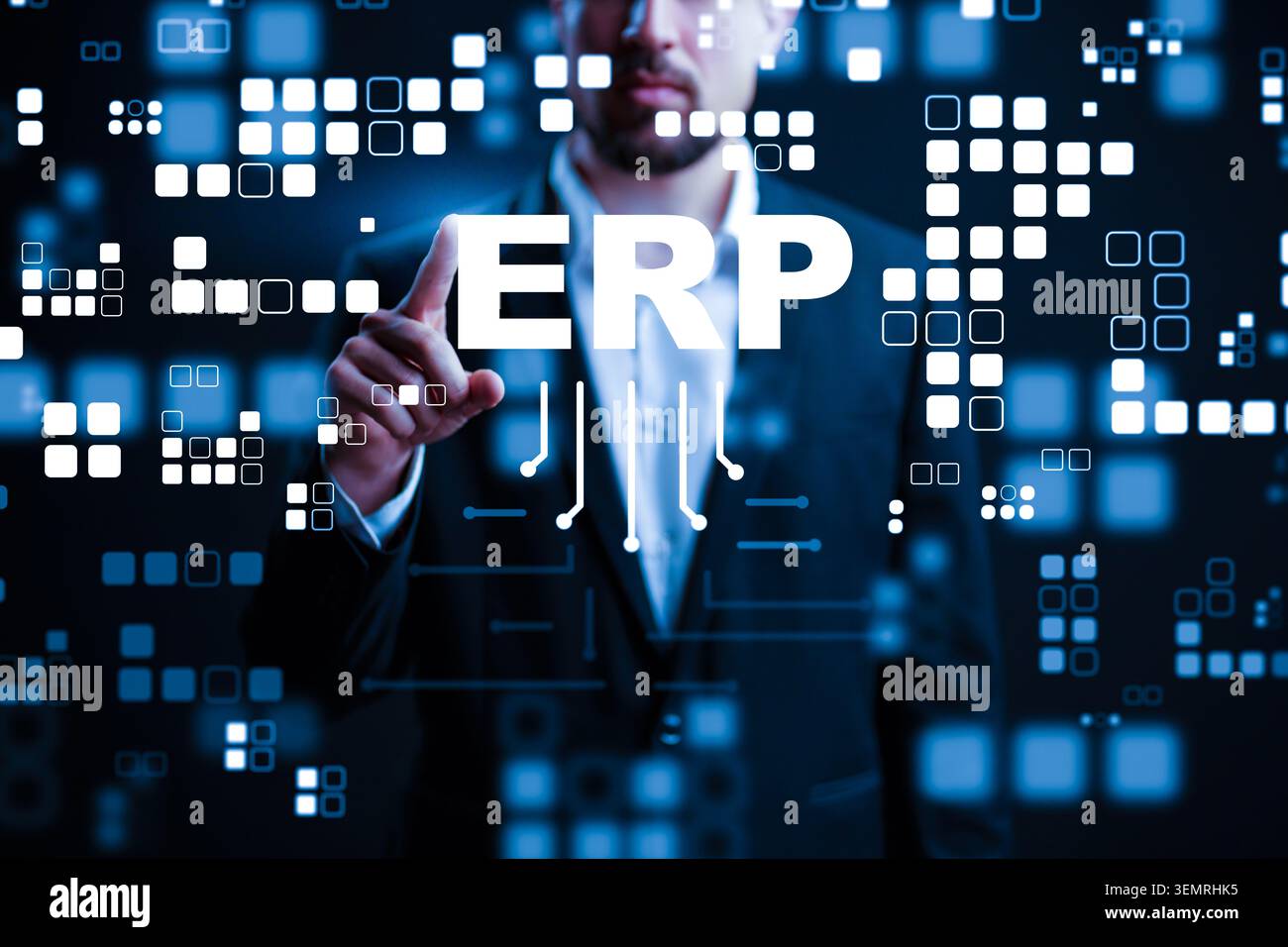 Business professional interacts with ERP system in a digital workspace setting Stock Photo