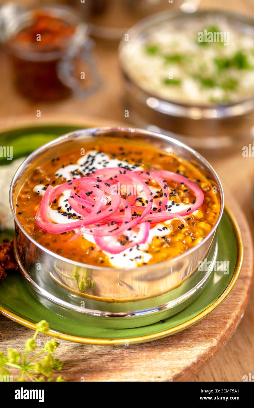 Setting Plating Family eating savory indian food hi-res stock photography and images ...