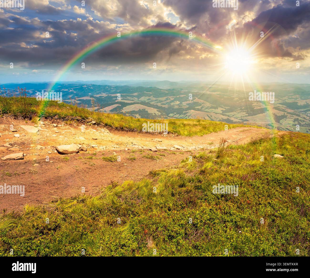 sunset over hiking path in carpathian mountains. alpine nature of transcarpathia in summer. ukraine mountain landscape for travel. views of borzhava r Stock Photo