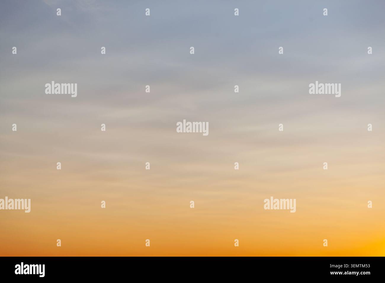 Clear and empty blue and orange gradient sky for background, horizontal image Stock Photo