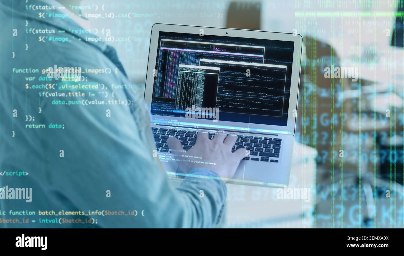 Software developer coding on laptop, digital data overlay, programming and cybersecurity, information technology Stock Photo