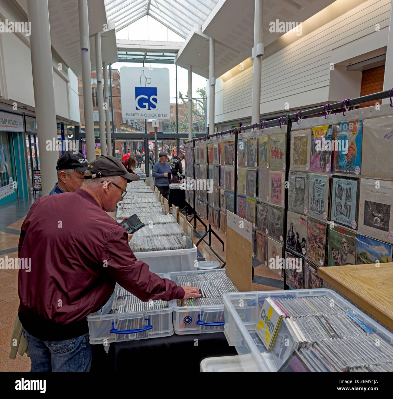 Shoppers browse vinyl records at the Triple J Record Fair inside Golden Square shopping centre, Warrington, in June 2026, reuse of retail Stock Photo