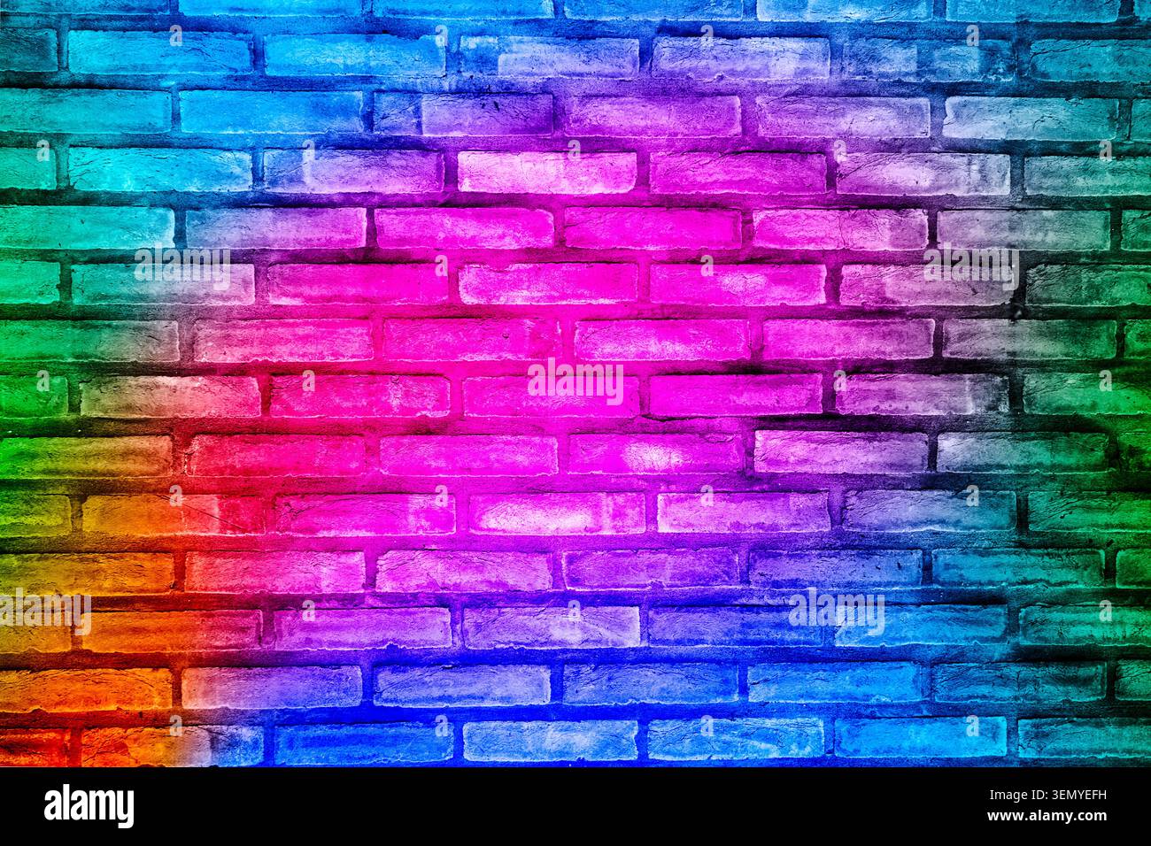 Abstract architectural background featuring an old brick wall surface illuminated with a colorful rainbow gradient of pink, purple, and blue neon ligh Stock Photo