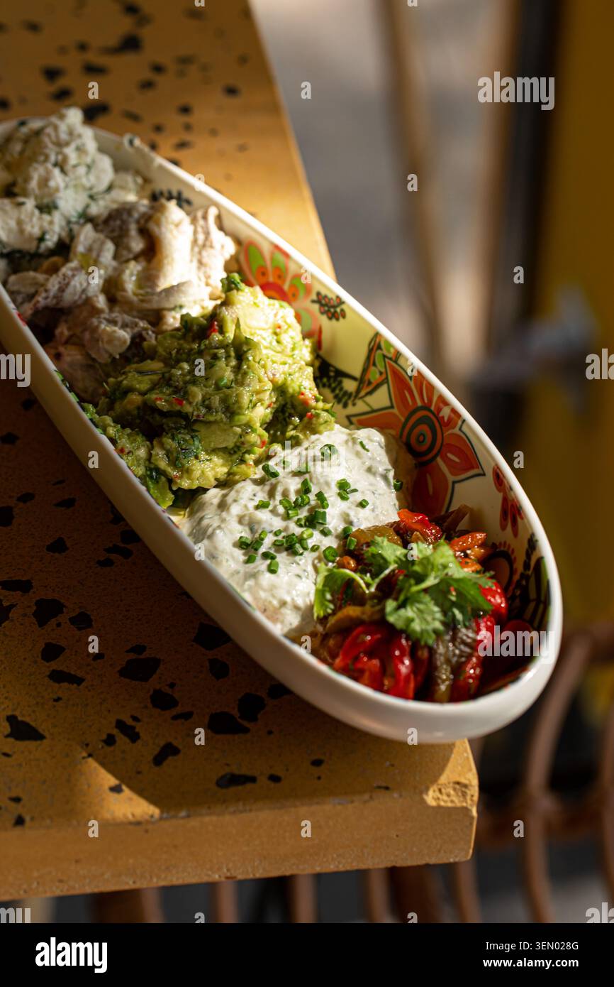 Assorted Mediterranean dips and appetizers platter Stock Photo