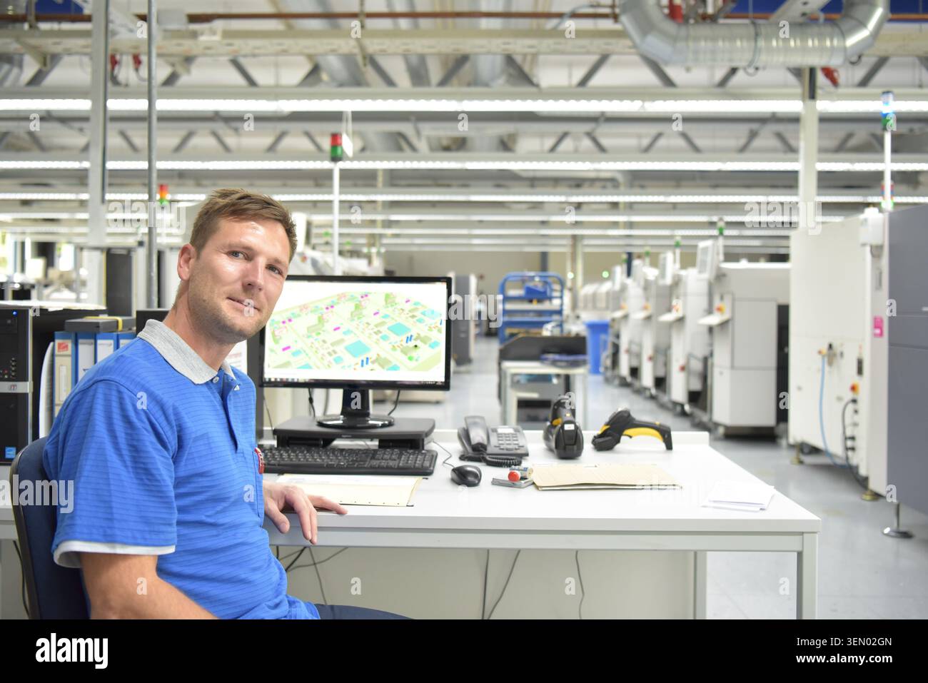 portrait of a worker in the engineering department of a factory for the production and construction of electronics Stock Photo