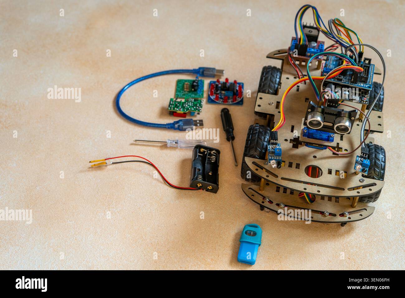 DIY Robot Car components. Educational electronics project for STEM learning and robotics. Stock Photo