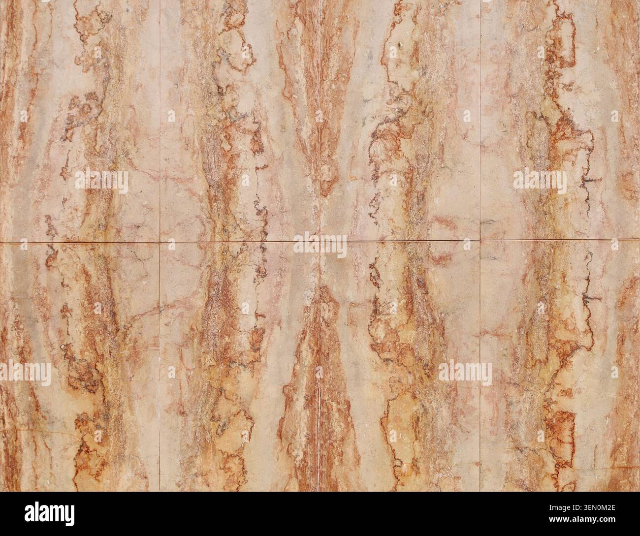 Large pinkish travertine tiles. Full frame, background and texture. Stock Photo