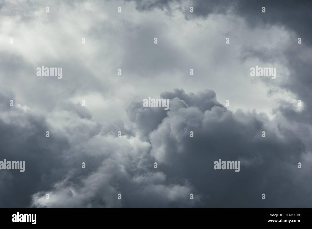 Dramatic gray clouds. Dark gloomy sky texture for background. Stock Photo