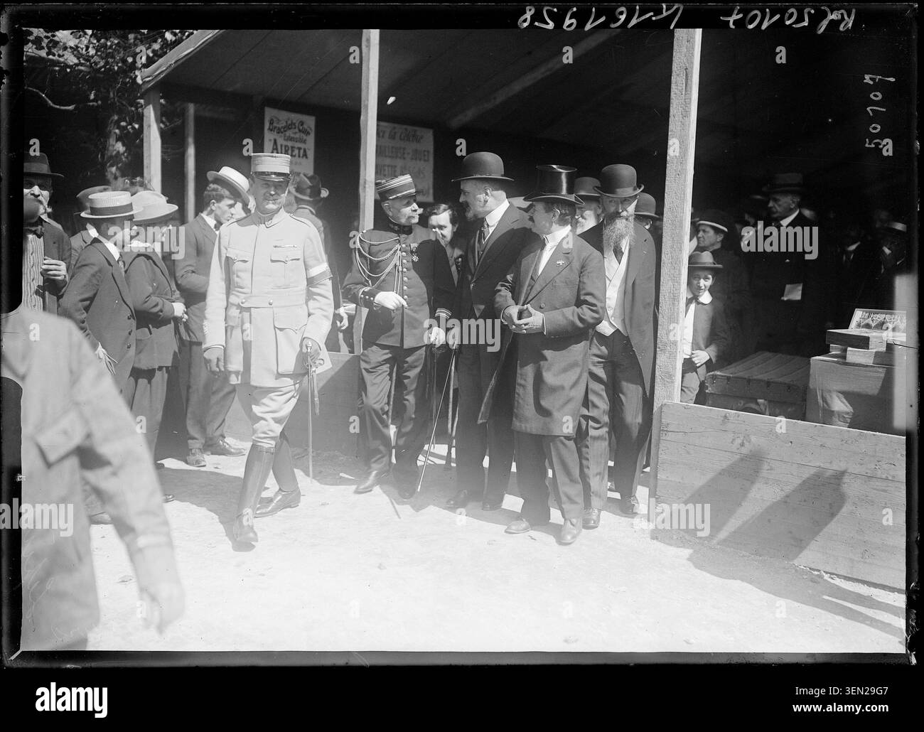 Louis Eugène Albéric Hudelo inaugurates the Lépine Competition in Paris in August 1917 in a press photograph by Agence Rol. The monochrome image records the official opening ceremony and participation in a Parisian invention contest. Stock Photo