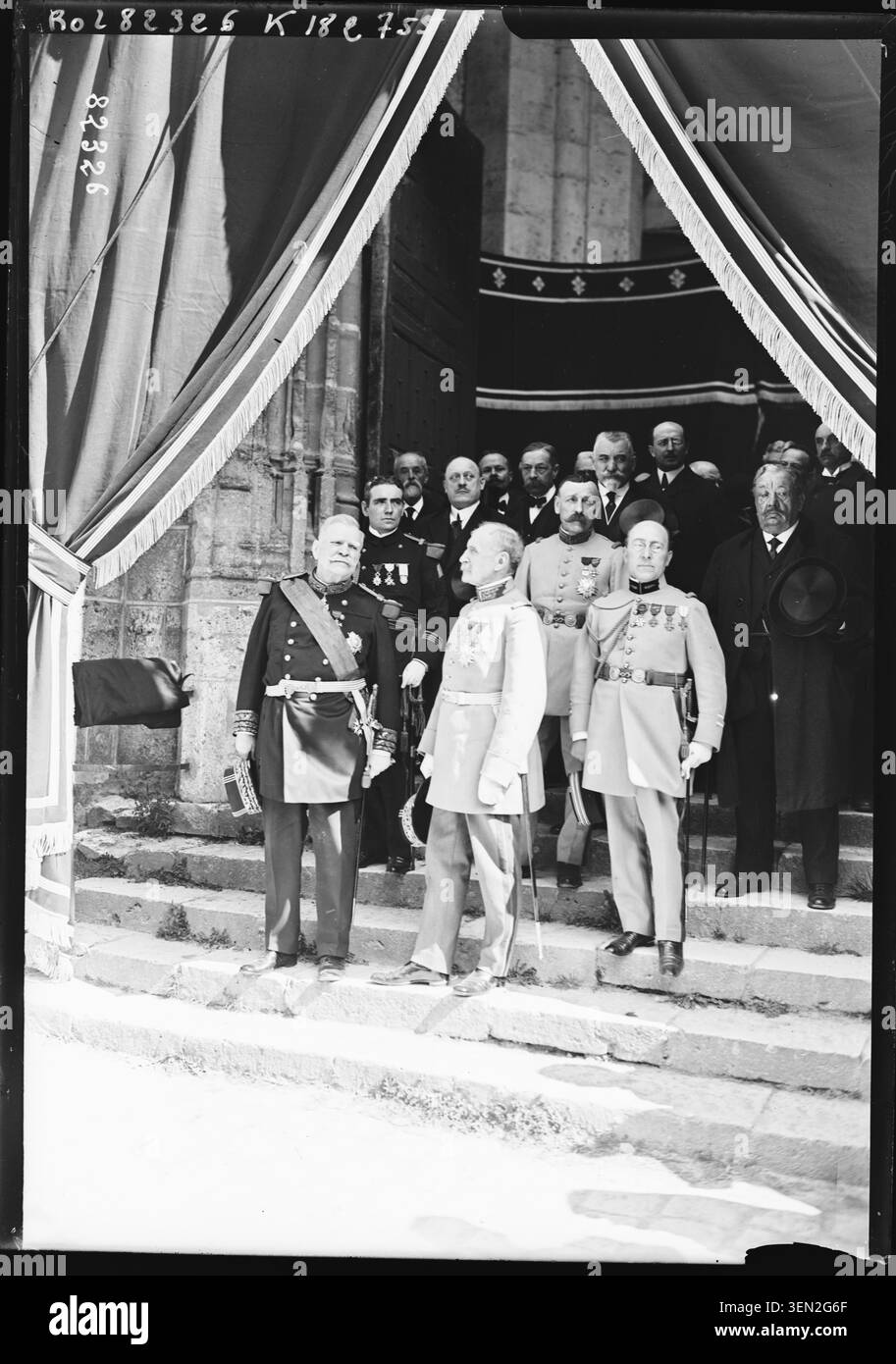 Funeral of General Maunoury at Mer, Press photograph records generals and political figures gathered on the forecourt of Saint Hilaire church in Mer Loir-et-Cher during the funeral ceremonies for General Joseph Maunoury in 1923. Stock Photo