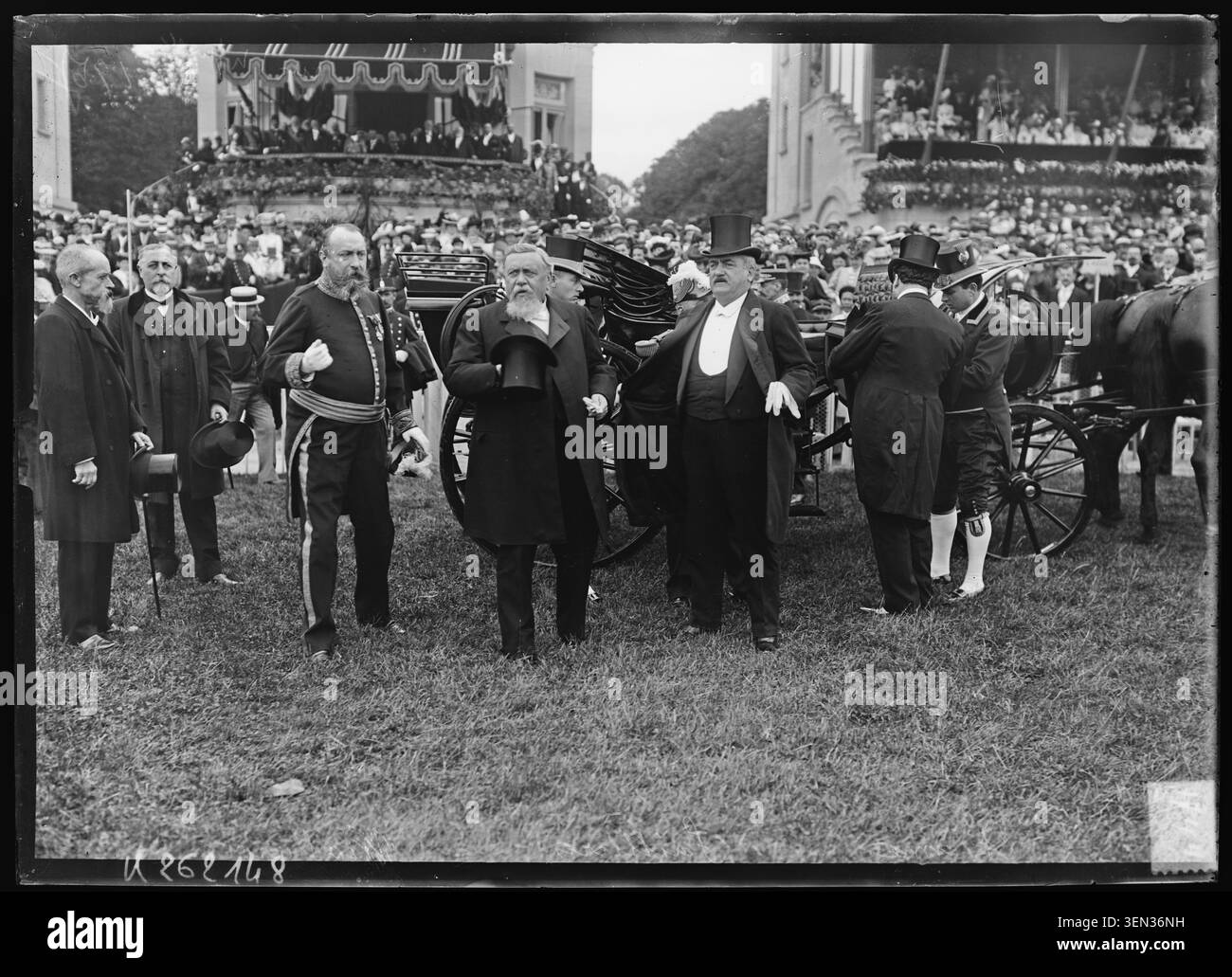 Armand Fallières, Louis Lépine, Armand Mollard, and Eugène Étienne attend the July 14 review at Longchamp Racecourse in Paris in 1906. The press photograph records collective portraits of officials and dignitaries during the national holiday parade. Stock Photo