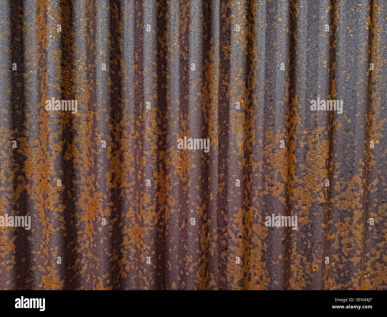 Dark Wavy Rusted Tin Background Stock Photo