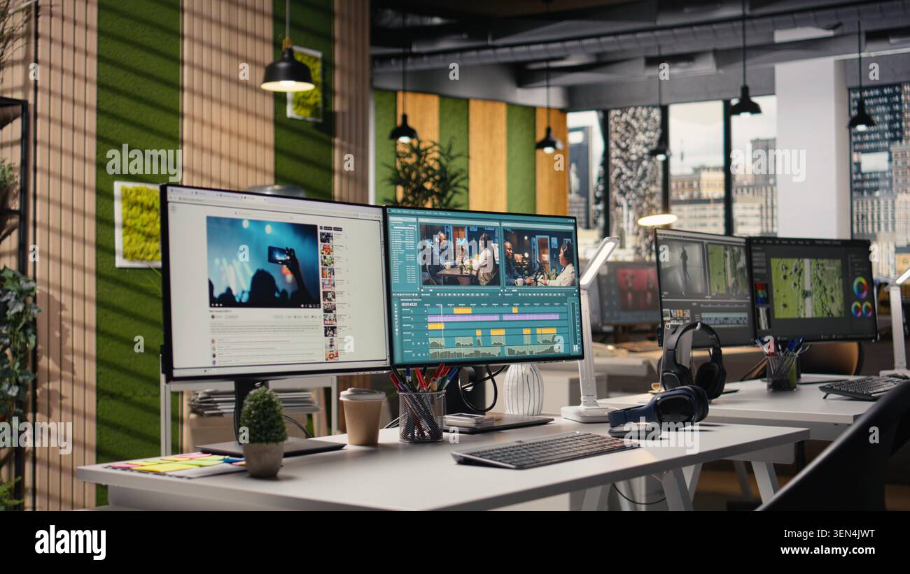 Studio with no people shows PC with advanced video editing software, interface displays recorded footage with sync tools and toolbar panels for adjustments. Creative post production process. Stock Photo
