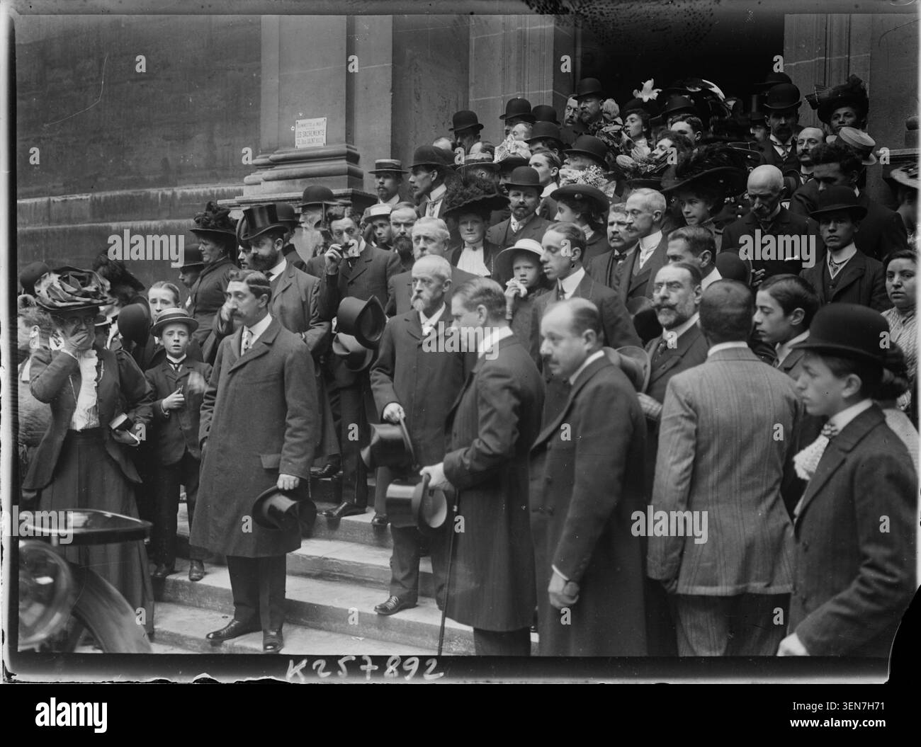 Alfonso XIII of Spain and Louis Lépine are associated with this press photograph connected with Saint-Roch Church in Paris. The record identifies the Spanish king during travels in France and references the Paris church location. Stock Photo