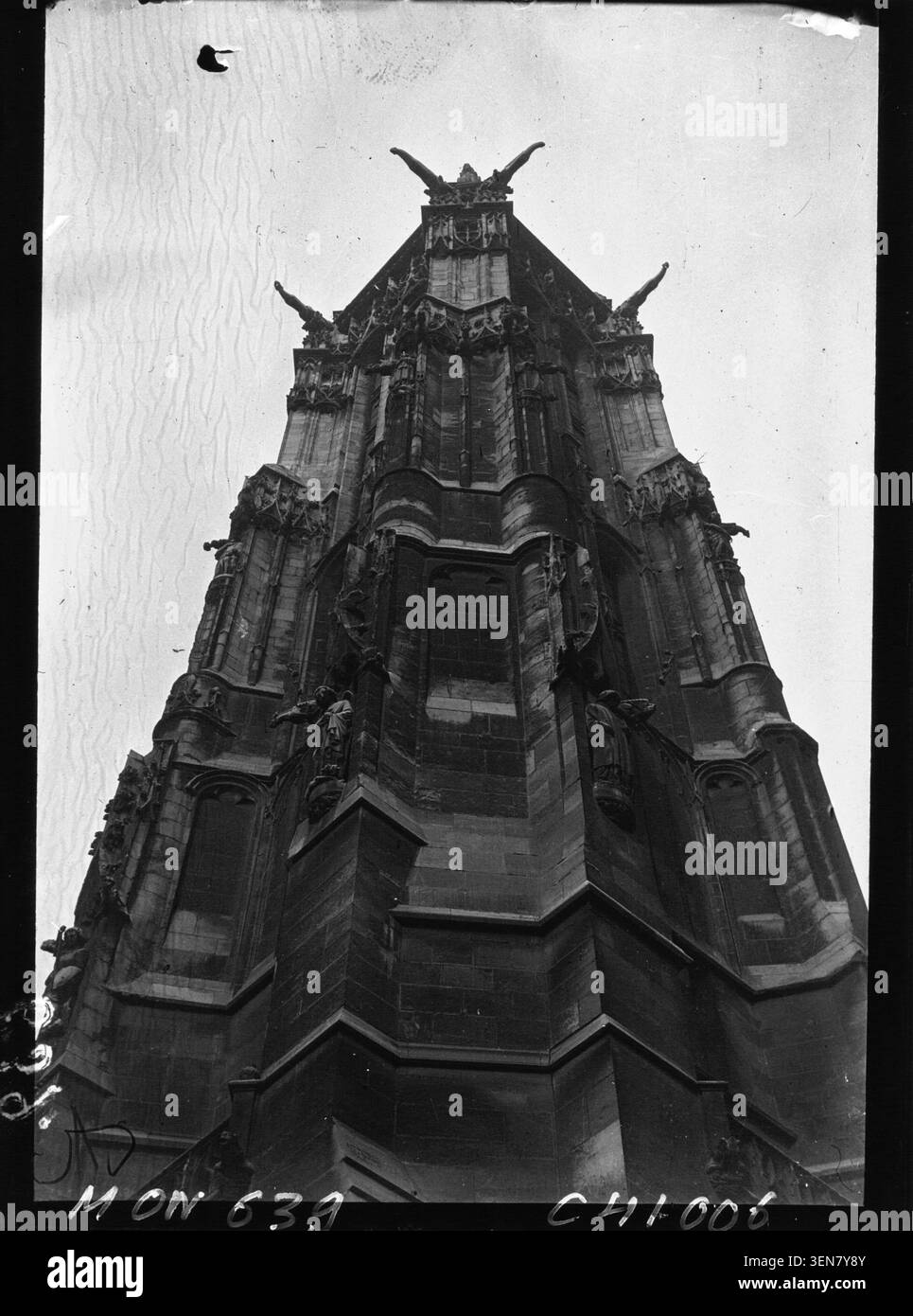 A press photograph records a distorted view of Saint-Jacques Tower in ...