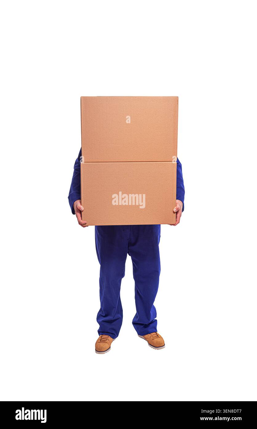 Worker in a blue uniform and red hard hat holds a blank cardboard sign against a white background. Stock Photo