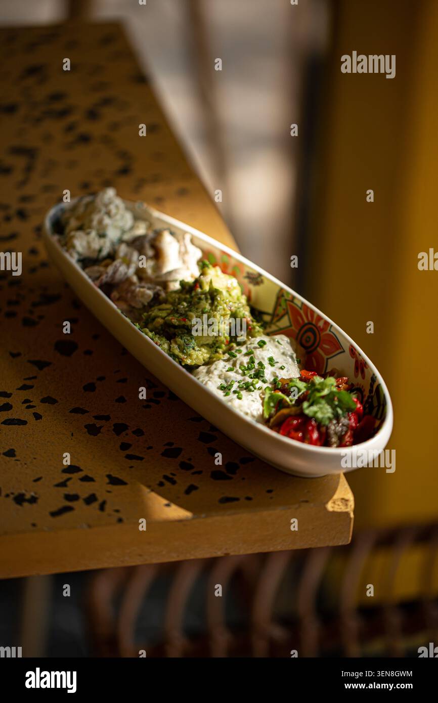 Assorted Mediterranean dips and appetizers platter Stock Photo