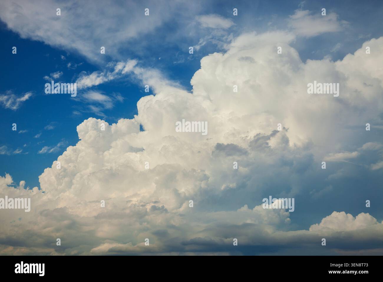 Beautiful dramatic high white clouds in a blue sky Stock Photo