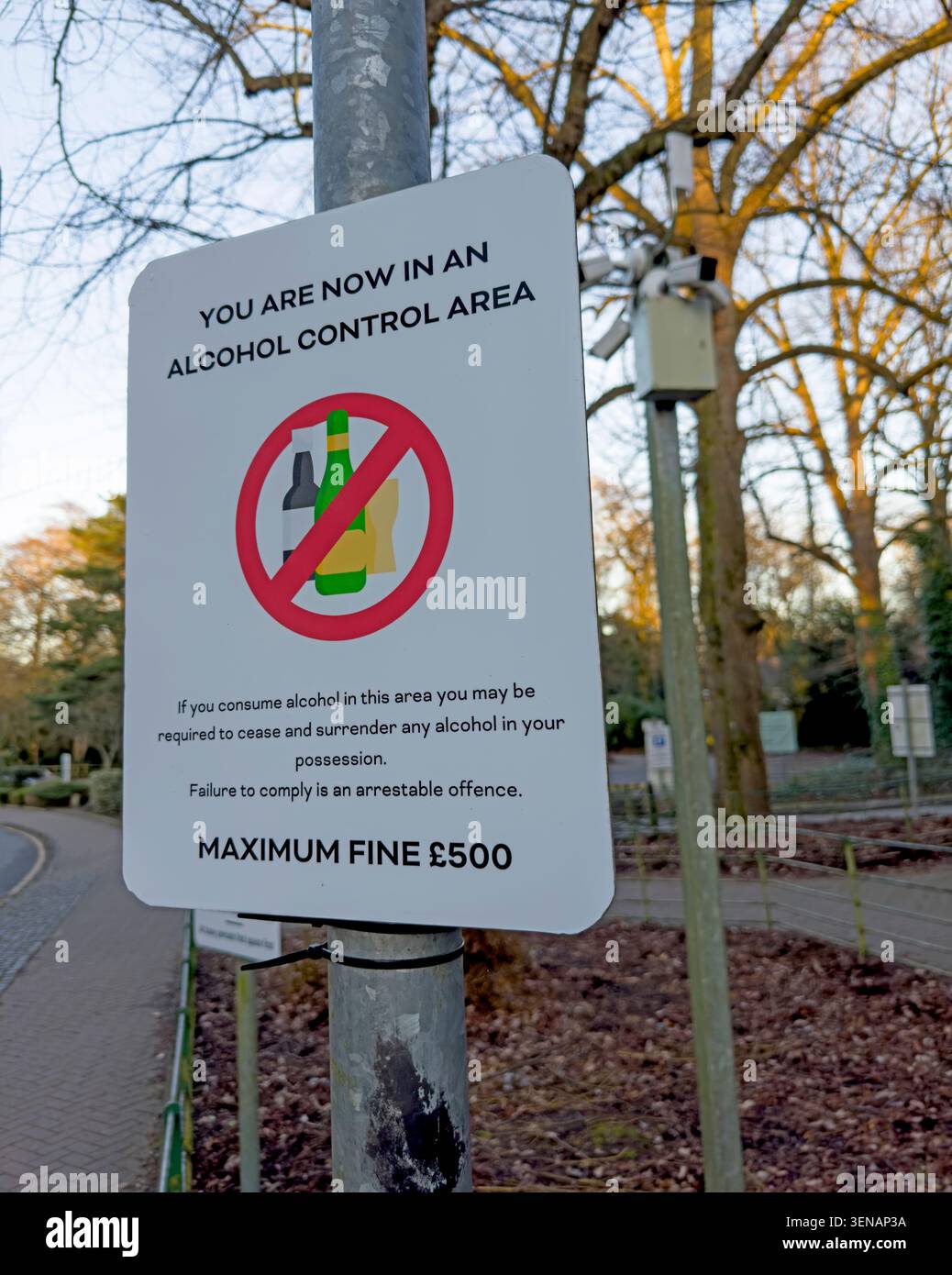 Alcohol Control Area warning sign with CCTV, advising no public drinking and a maximum £500 fine in Cheshire, England Stock Photo