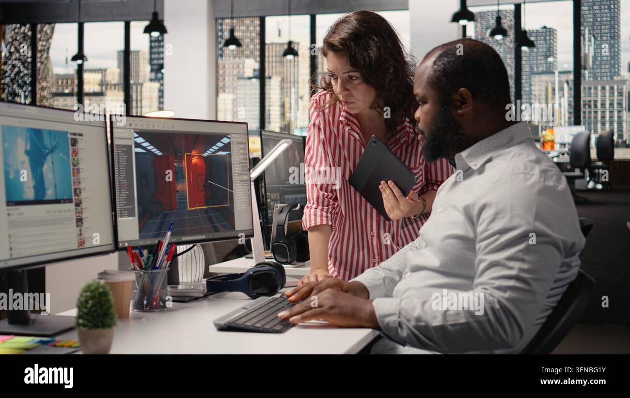 Diverse software developers programming hi-res stock photography and ...