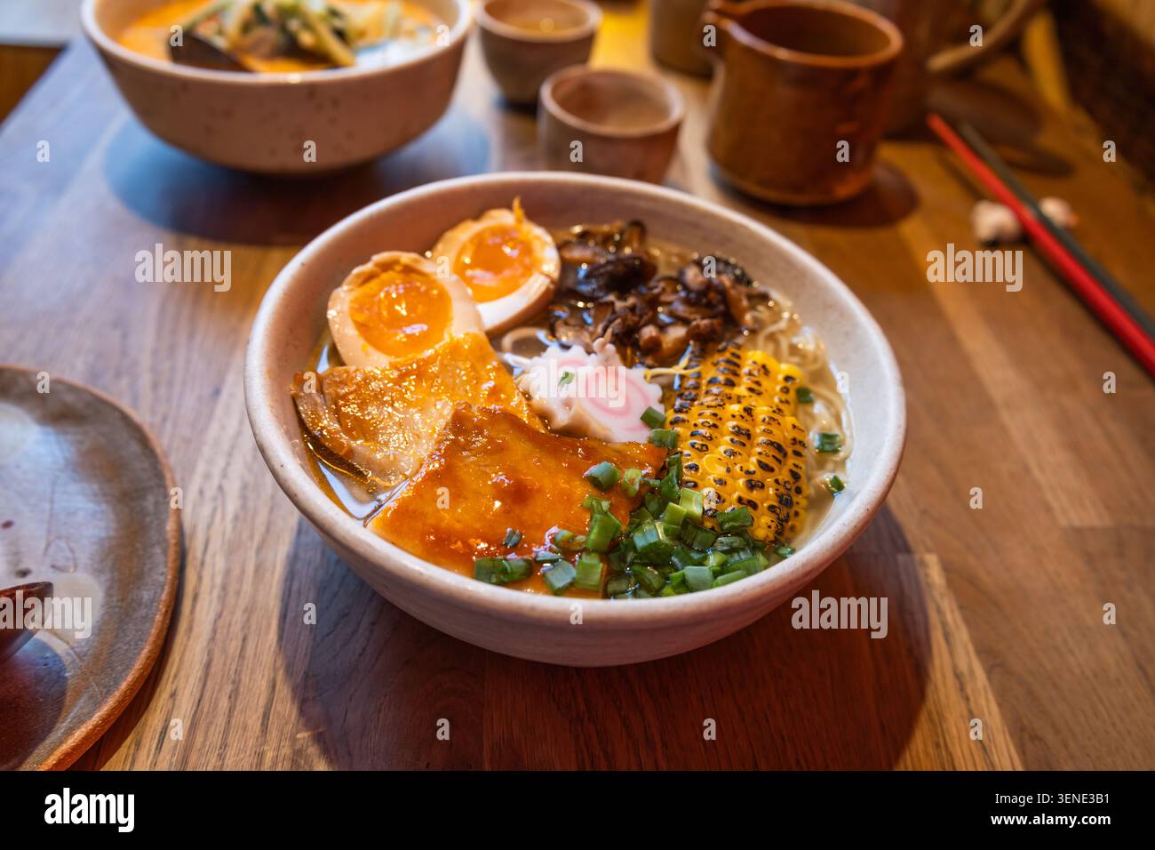 Authentic Japanese ramen bowl with soft boiled egg and pork Stock Photo