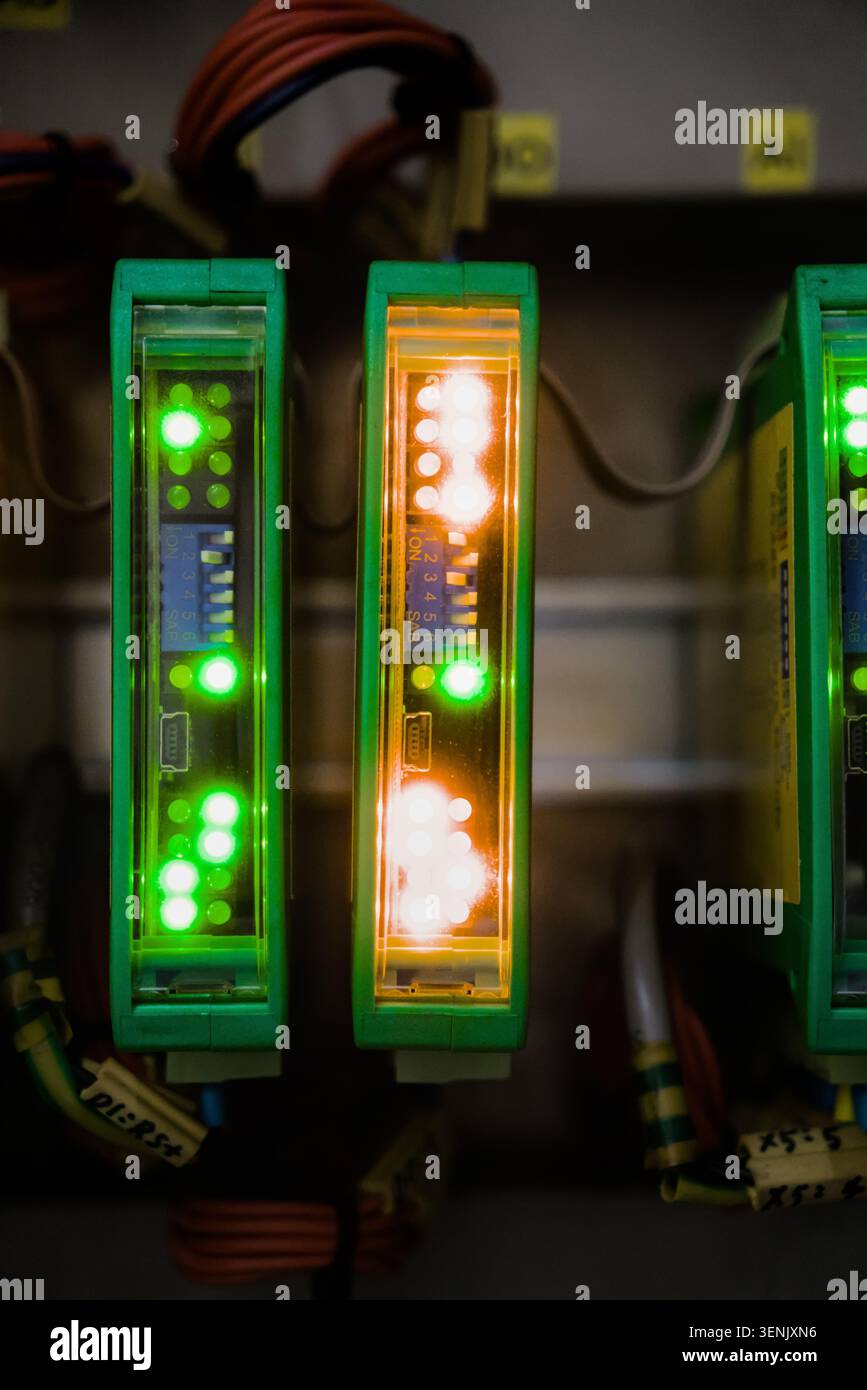 Closeup of PLC Modules Status LED Lights on Control Panel Stock Photo