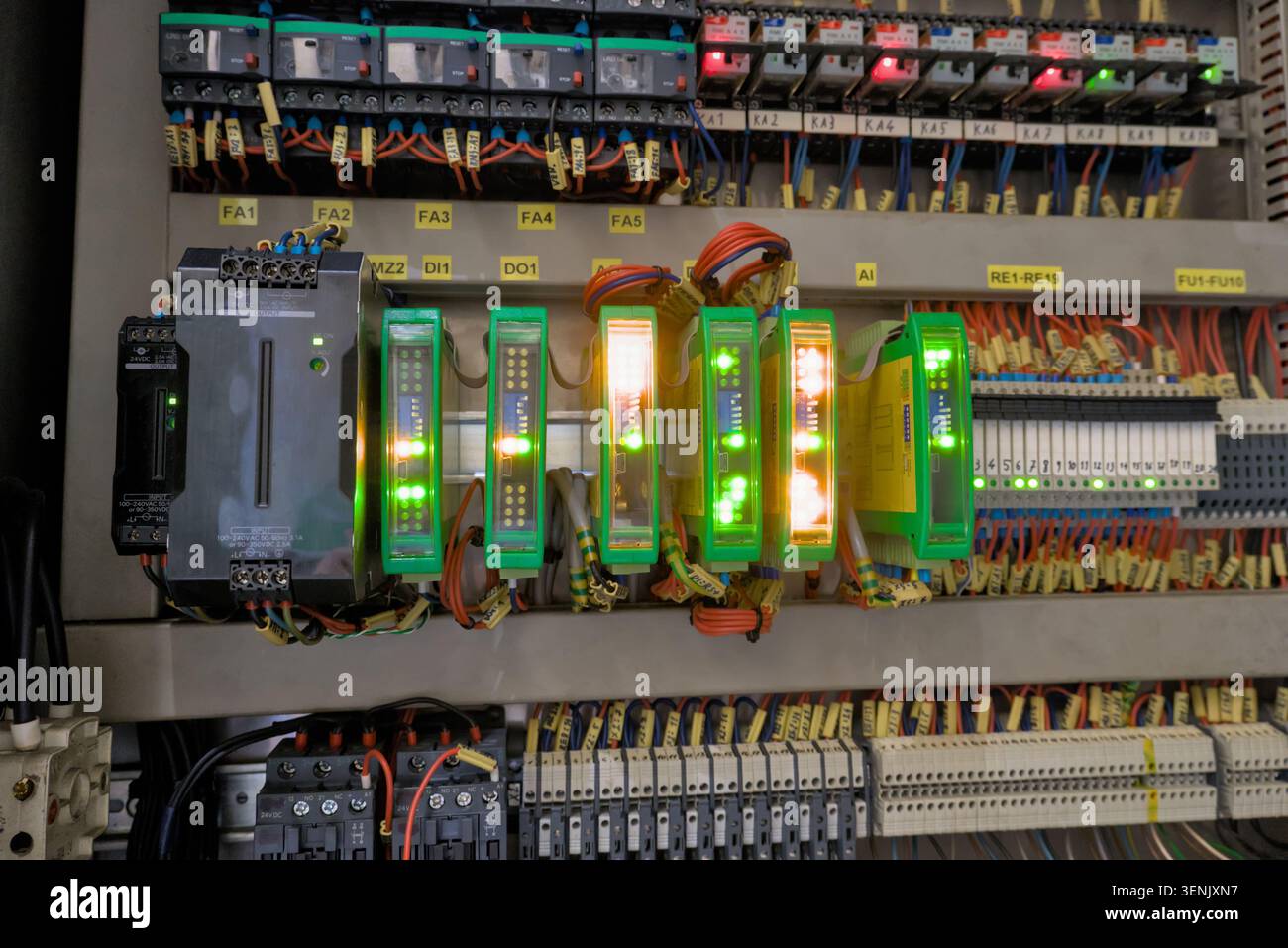 Programmable Logic Controller PLC System in Industrial Cabinet Stock Photo