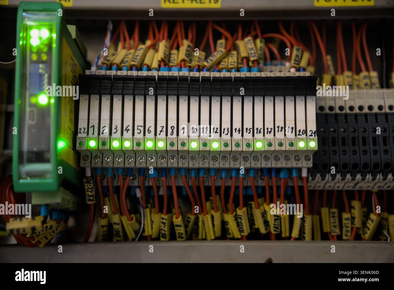 Row of Numbered Relay Modules in Electrical Control Board Stock Photo
