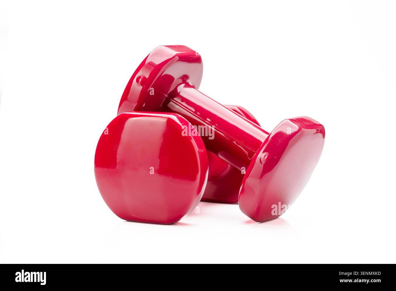 Pair of pink dumbbells isolated on white background representing fitness and healthy lifestyle Stock Photo