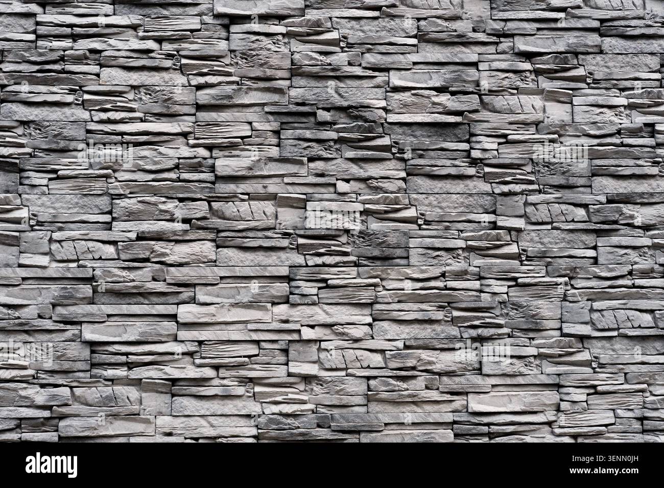 Decorative slate stone cladding surface for interior or exterior design. Stock Photo
