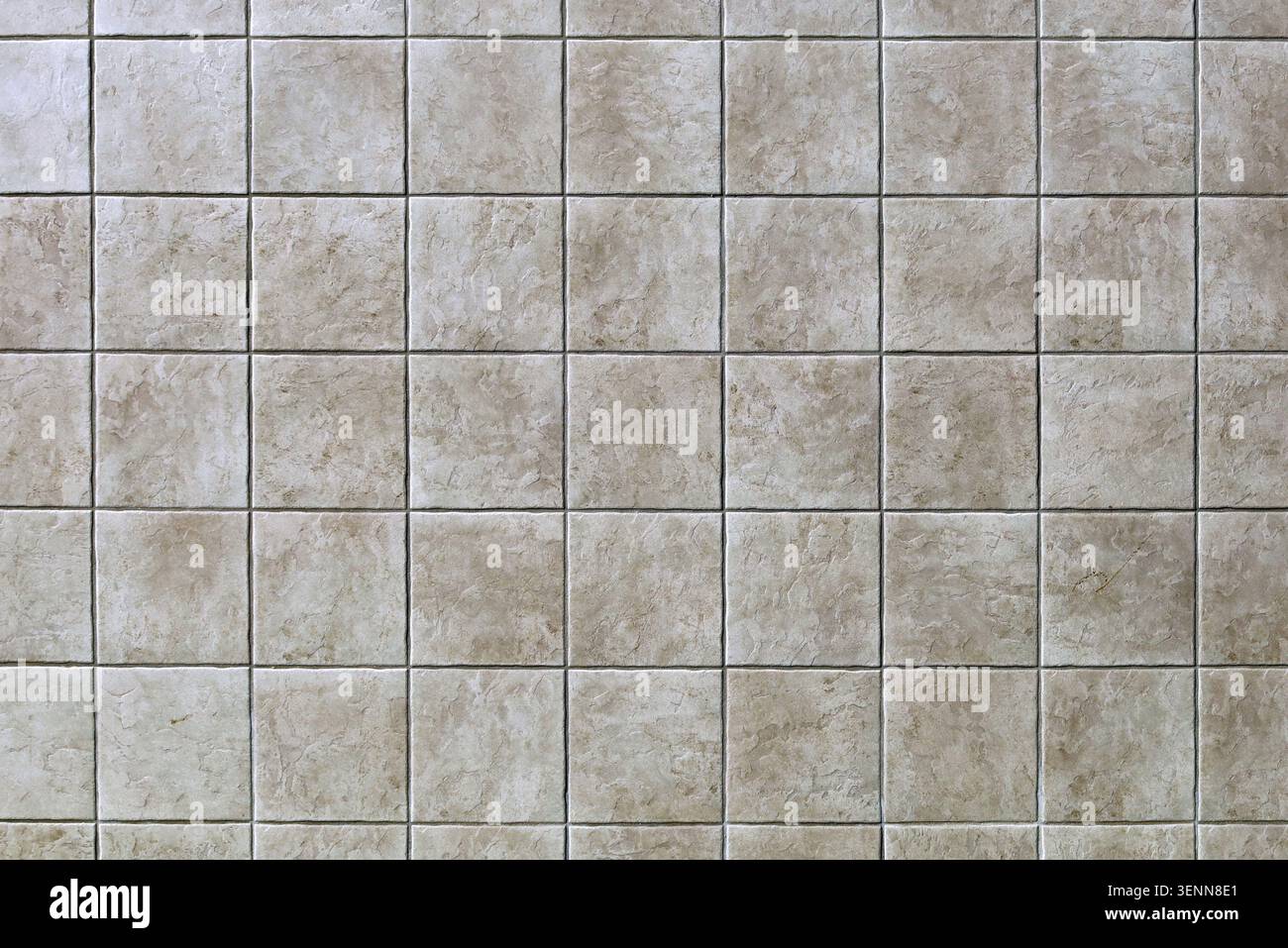 Light brown ceramic tiled floor with stone effect, rustic style. Background and texture. Stock Photo