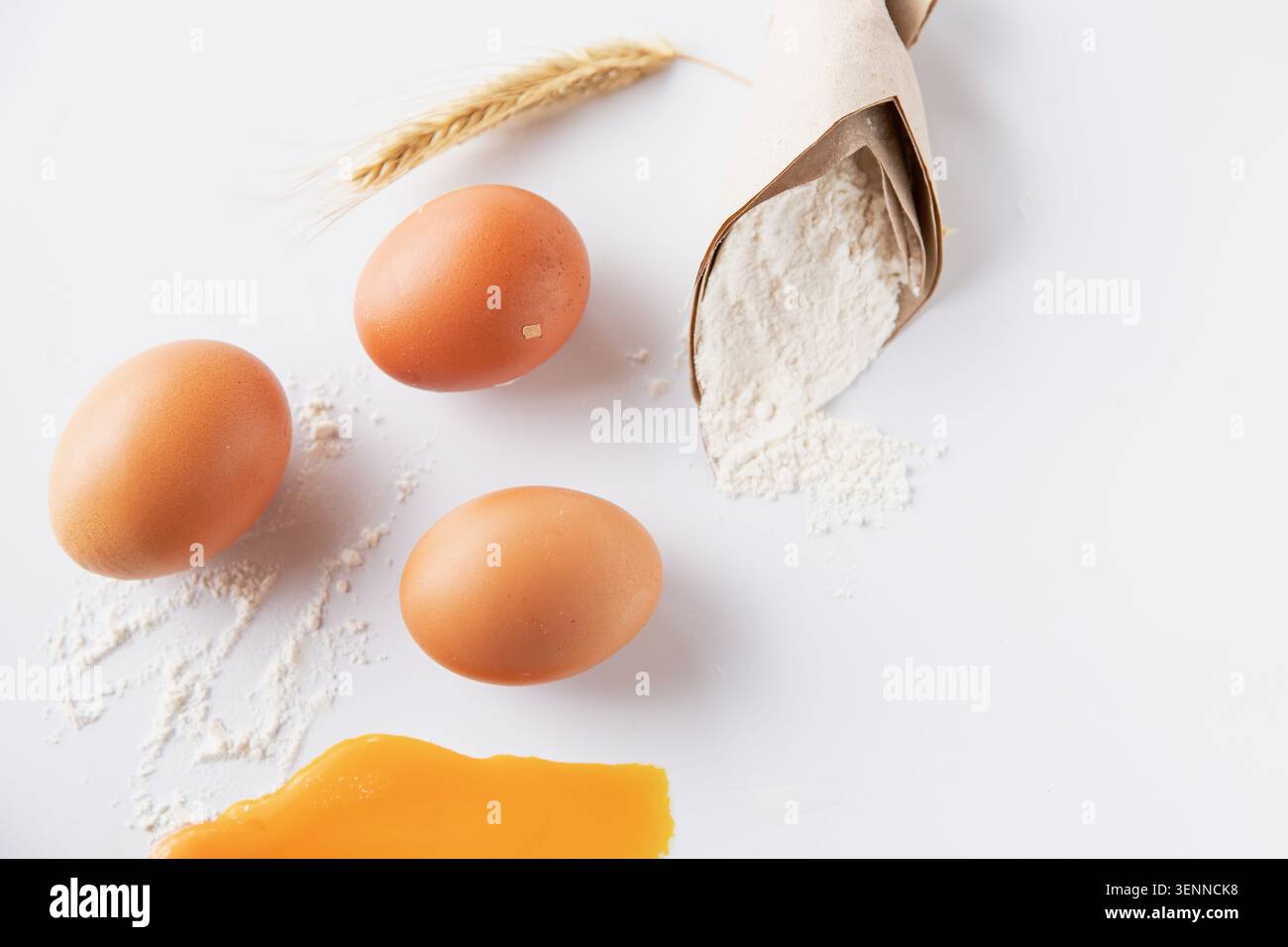 Fresh Chicken Eggs With Wheat Flour And Raw Egg Yolk For Homemade Baking Ingredients Stock Photo