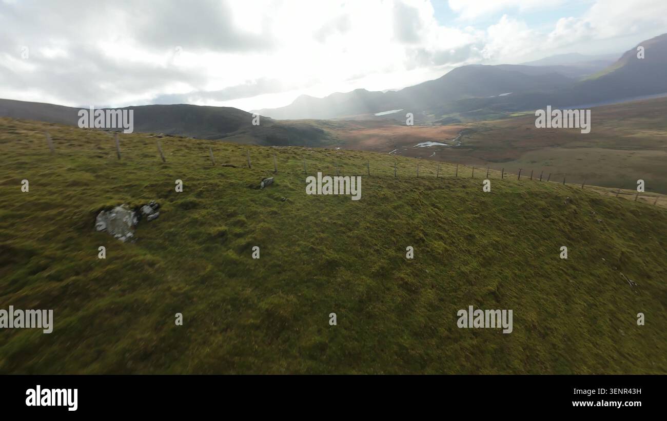 Snowdonia FPV: Dynamic Flight Over Ranger Path Hiking Trail Stock Photo