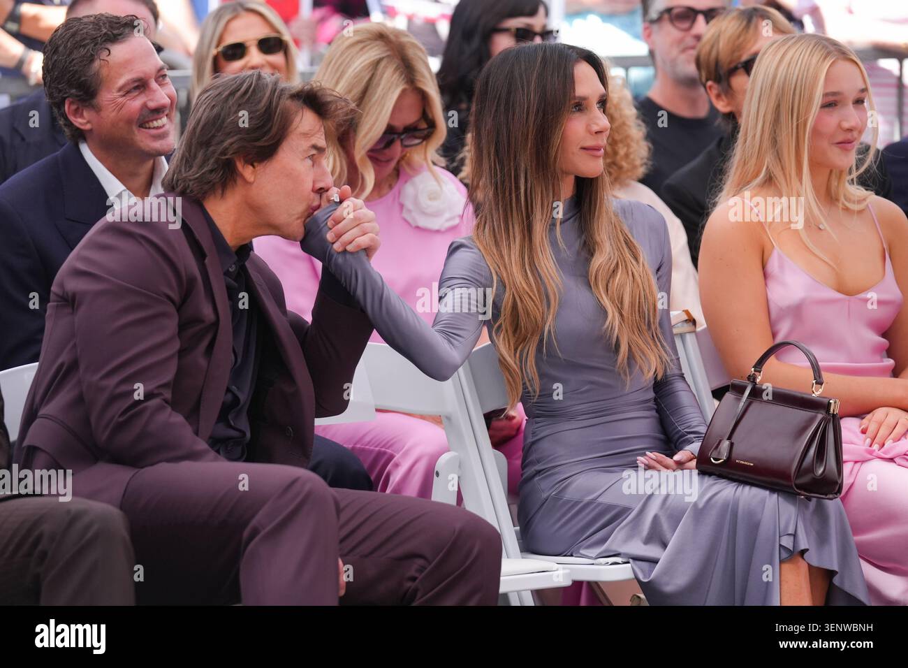 Tom Cruise, from left, Victoria Beckham, and Harper Seven Beckham a ceremony honoring David Beckham with a star on the Hollywood Walk of Fame on Friday, June 12, 2026, in Los Angeles. (AP Photo/Chris Pizzello) Stock Photo