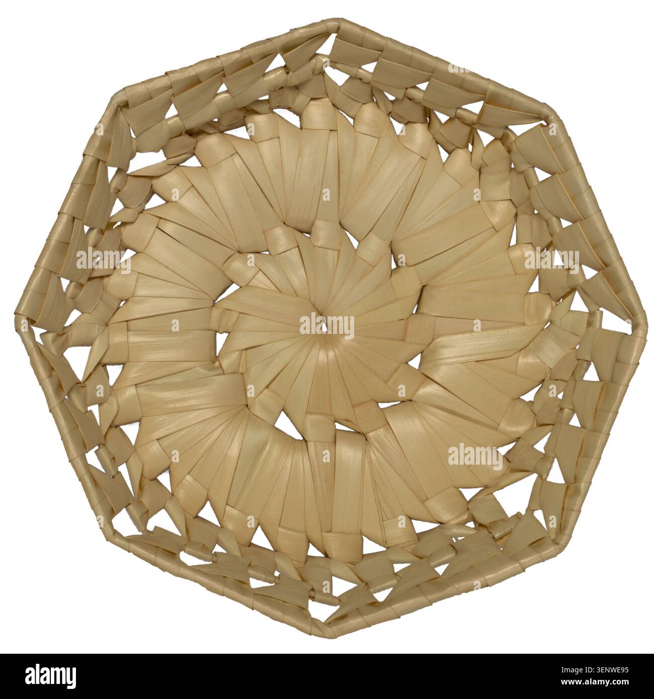 Octagonal wicker basket on a white background. View from above. Stock Photo