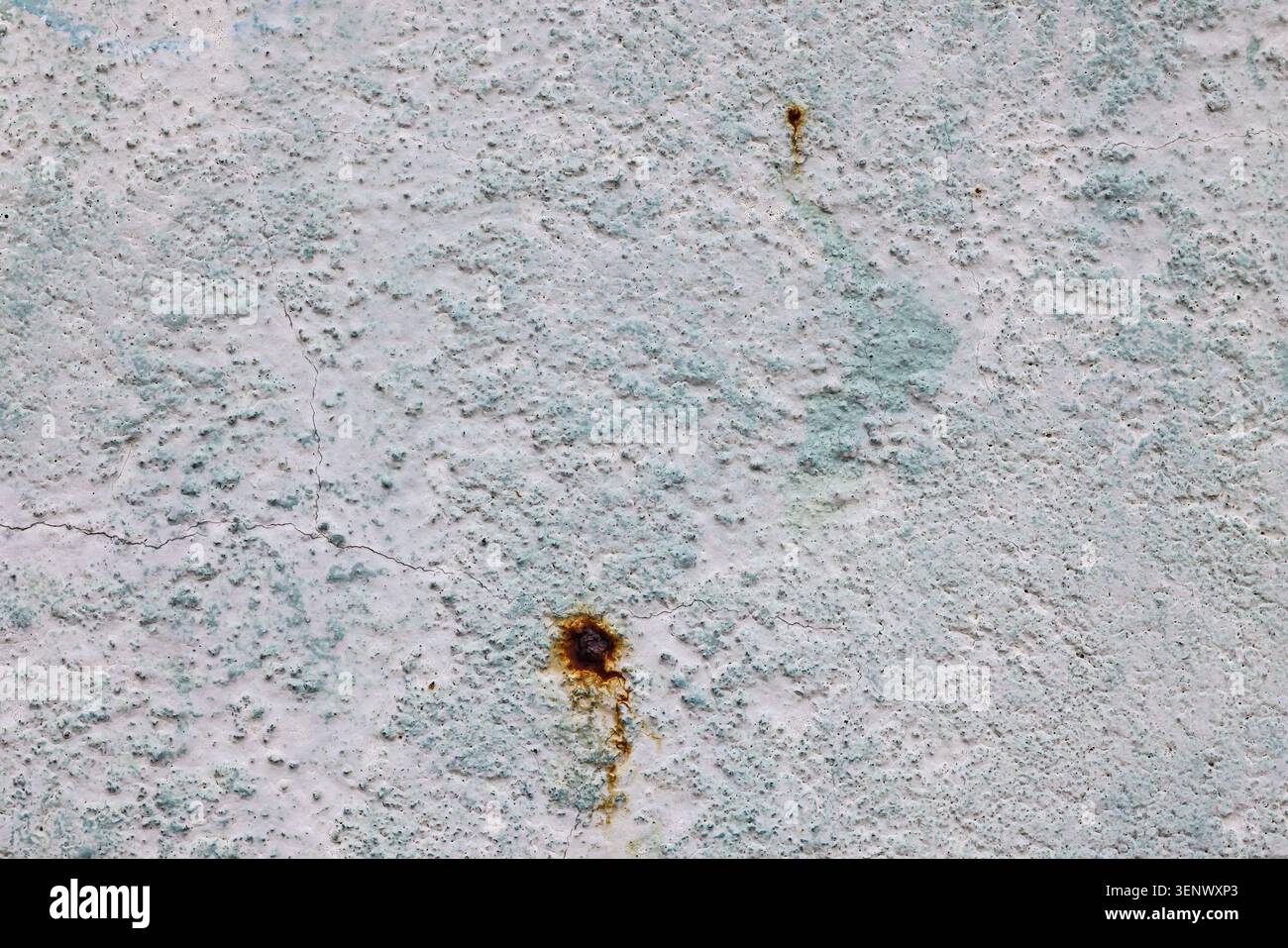 Weathered Concrete Wall Texture with Rust Marks and Cracks Stock Photo