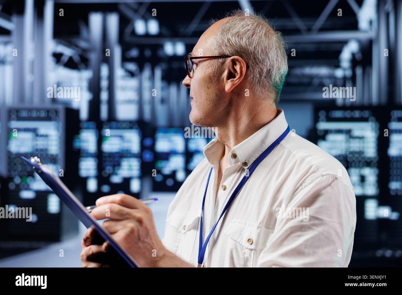Elderly engineer in crypto mining farm with specialized hardware using blockchain technology, with fintech expert holding clipboard, inspecting asic rigs solving complex computational problems. Stock Photo