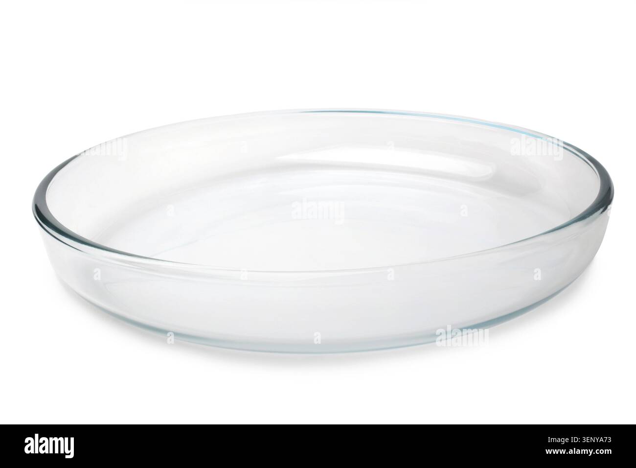 Round glass baking tray on white background Stock Photo